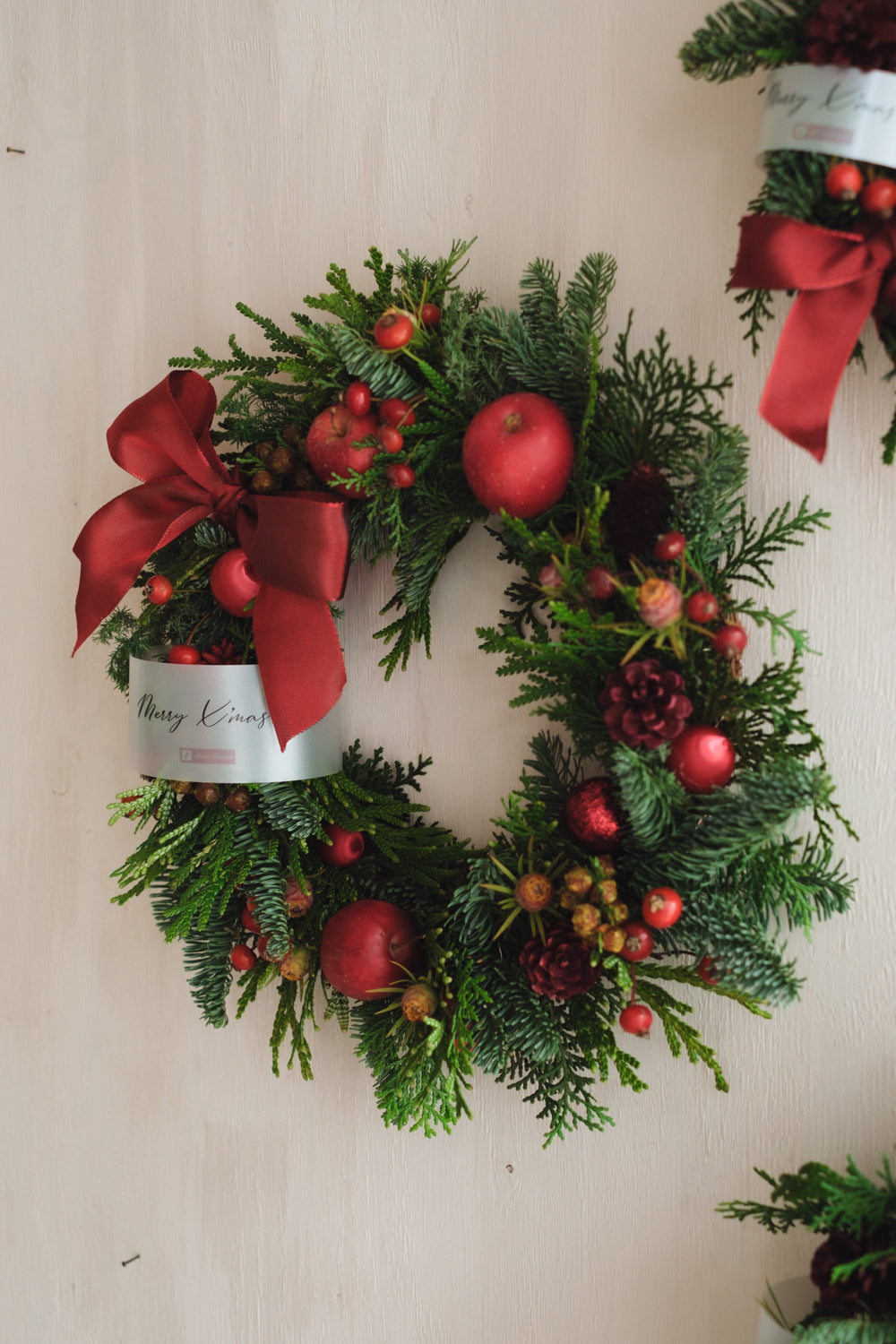 ◆11/26からお届け可能・クリスマス限定◆Round Wreath／ラウンドモミのリース　ウォームホリデー／生花